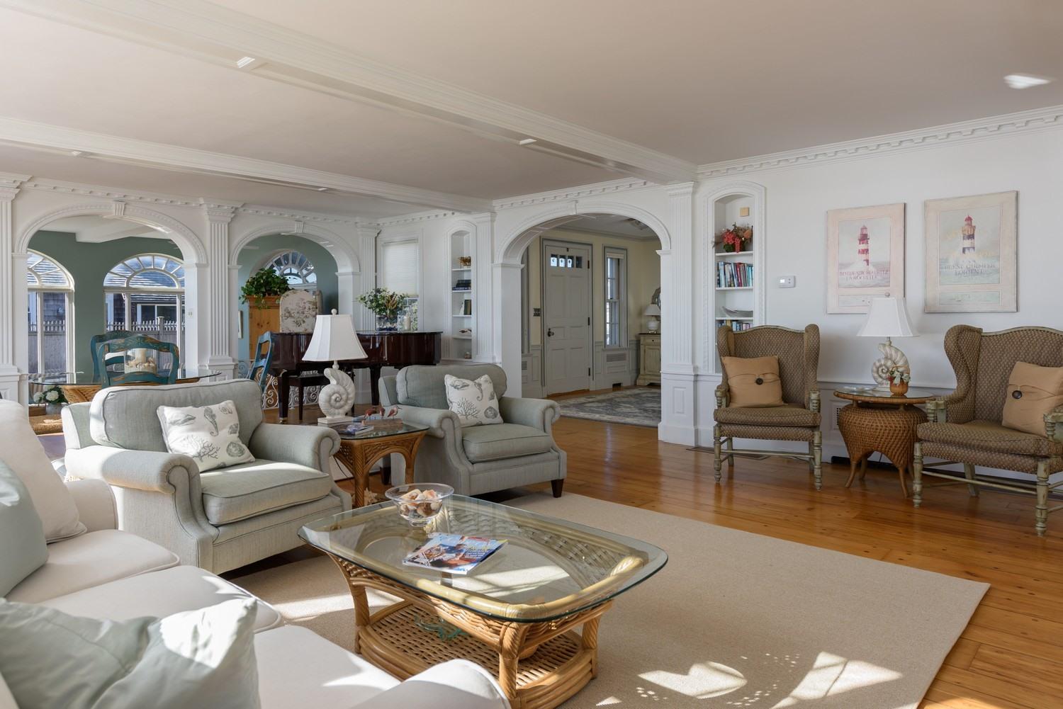 283 Long Beach Road Centerville, MA 02632 - Photo 11 of 30 a living room with furniture a rug and a window