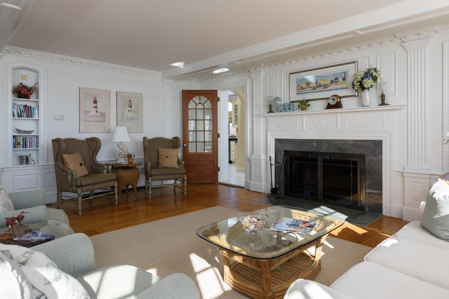 283 Long Beach Road Centerville, MA 02632 - Photo 12 of 30 a living room with furniture and a fireplace
