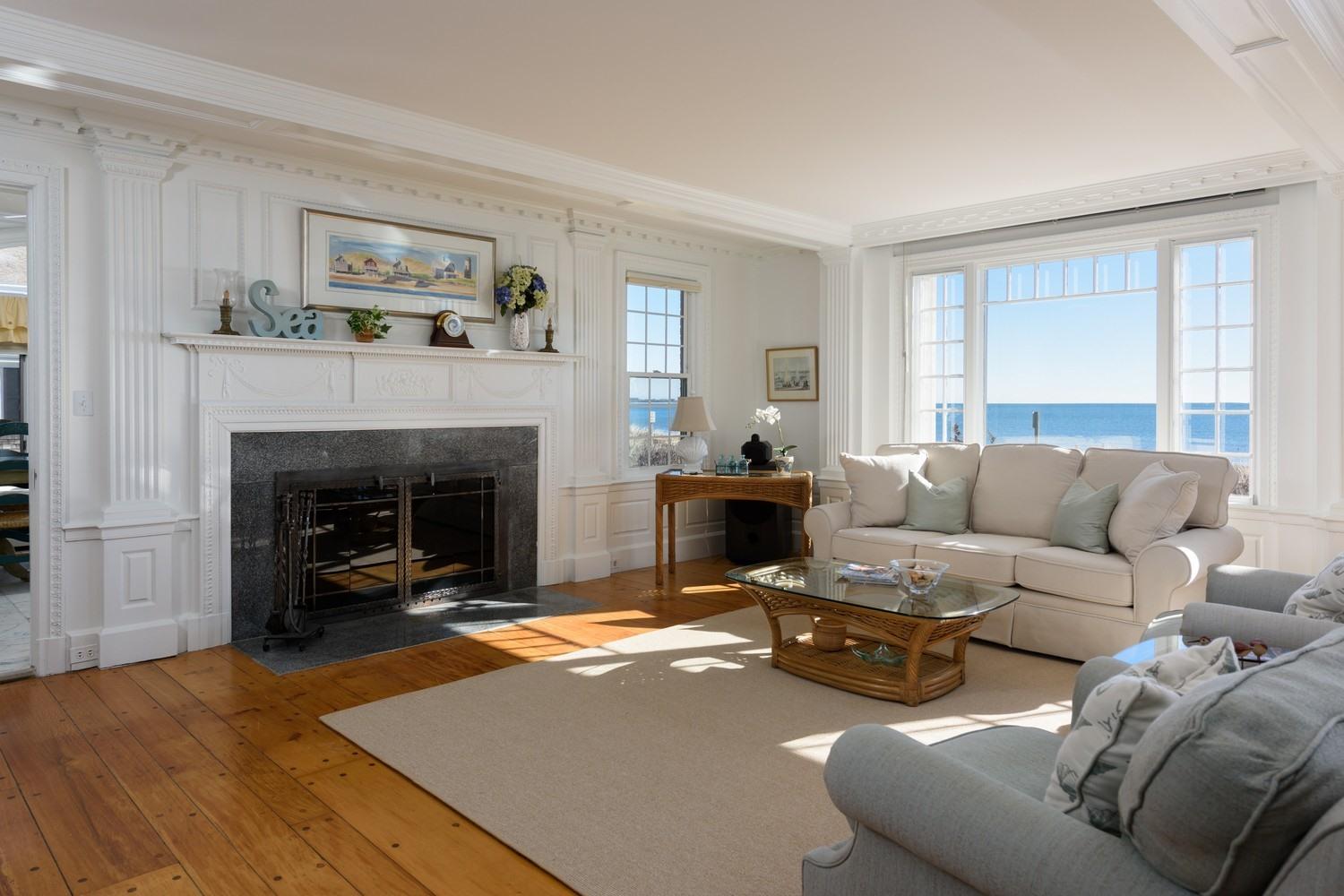 283 Long Beach Road Centerville, MA 02632 - Photo 14 of 30 a living room with furniture and a fireplace