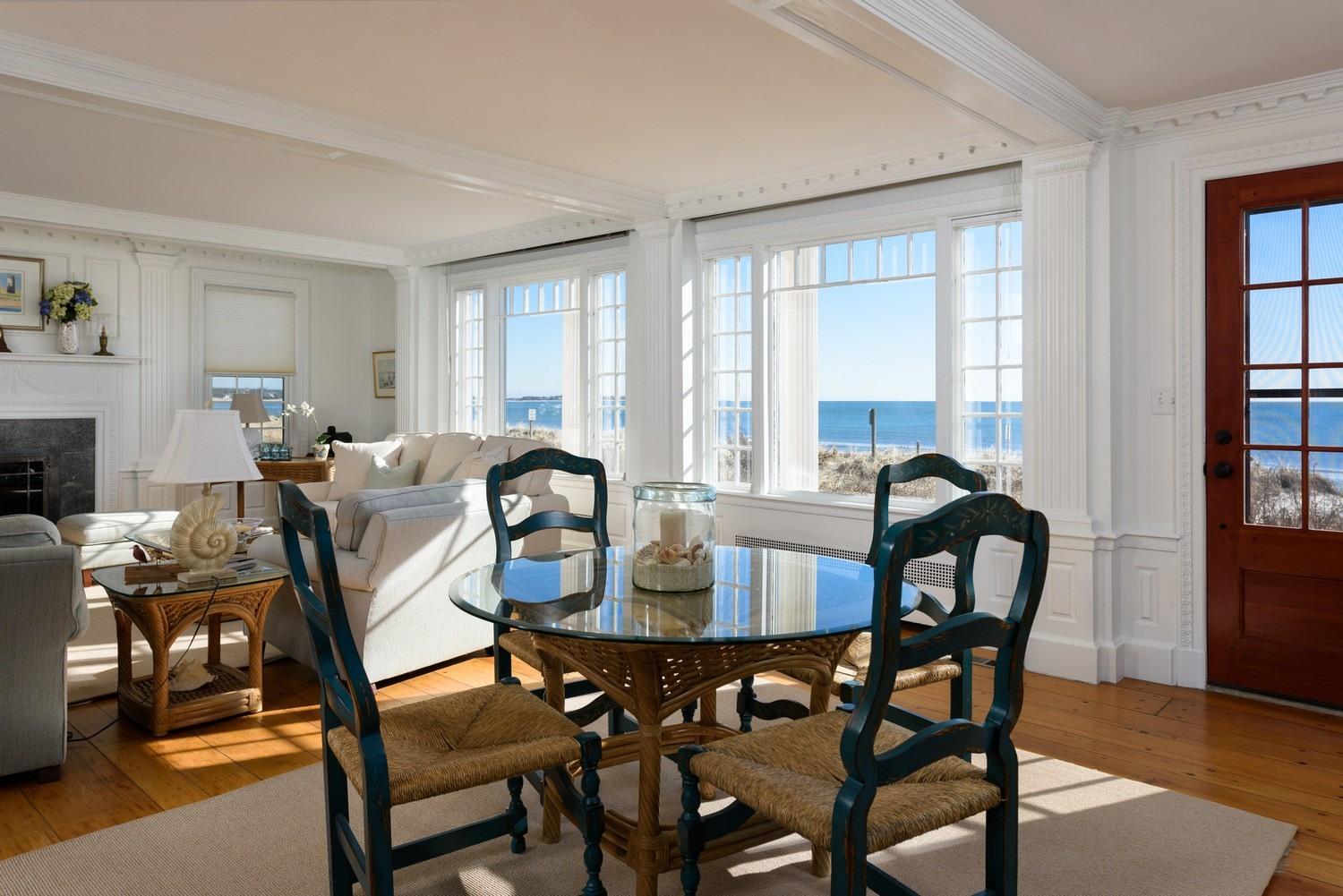 283 Long Beach Road Centerville, MA 02632 - Photo 15 of 30 a view of a a dining room with furniture window and wooden floor