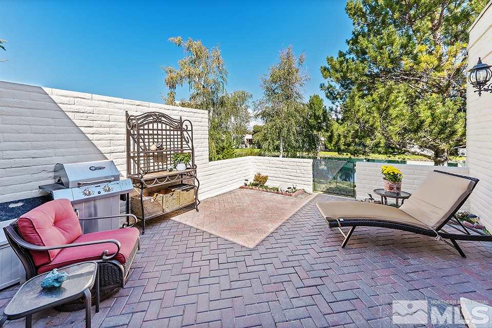 4945 West Lakeridge Terrace Reno, NV 89509 - Photo 21 of 25 a view of a chairs and table in the patio