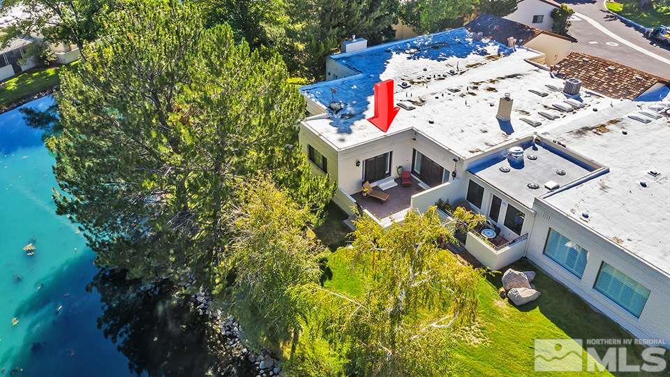 4945 West Lakeridge Terrace Reno, NV 89509 - Photo 24 of 25 an aerial view of a house with a swimming pool