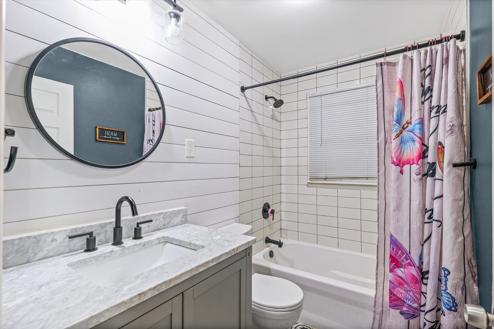 215 North 3rd Street Fisher, IL 61843 - Photo 16 of 32 a bathroom with a sink and a mirror