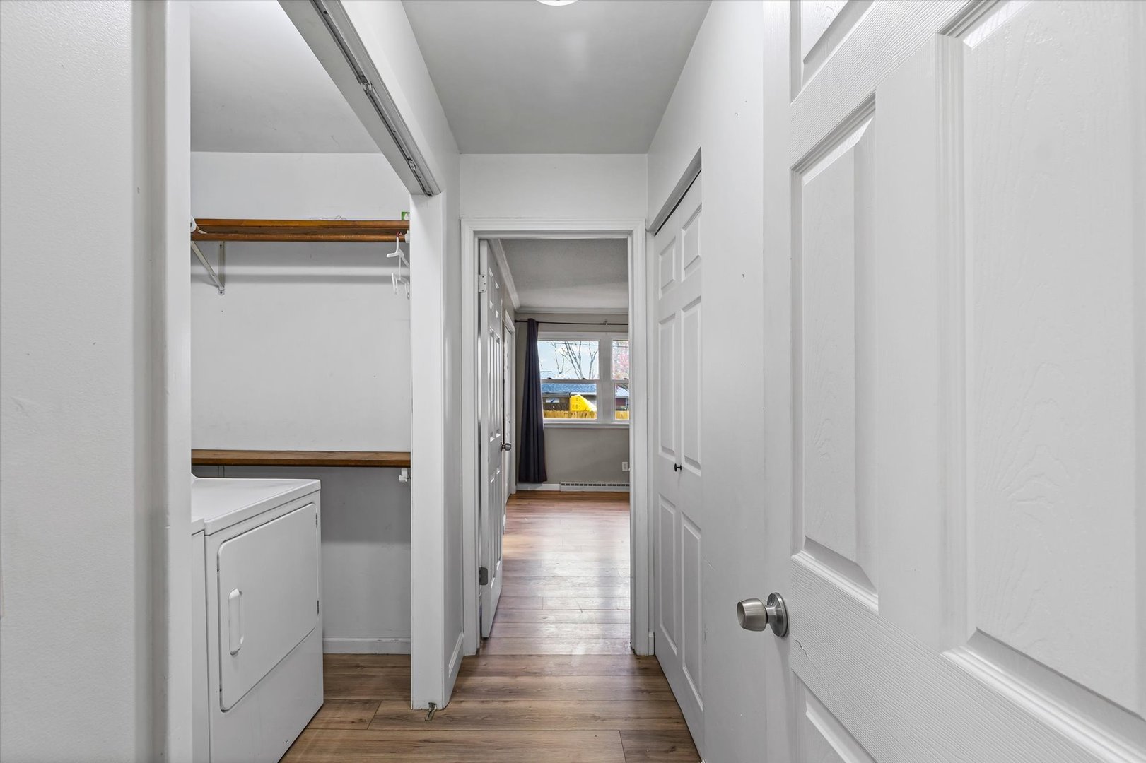 215 North 3rd Street Fisher, IL 61843 - Photo 17 of 32 a view of a hallway with wooden floor and staircase
