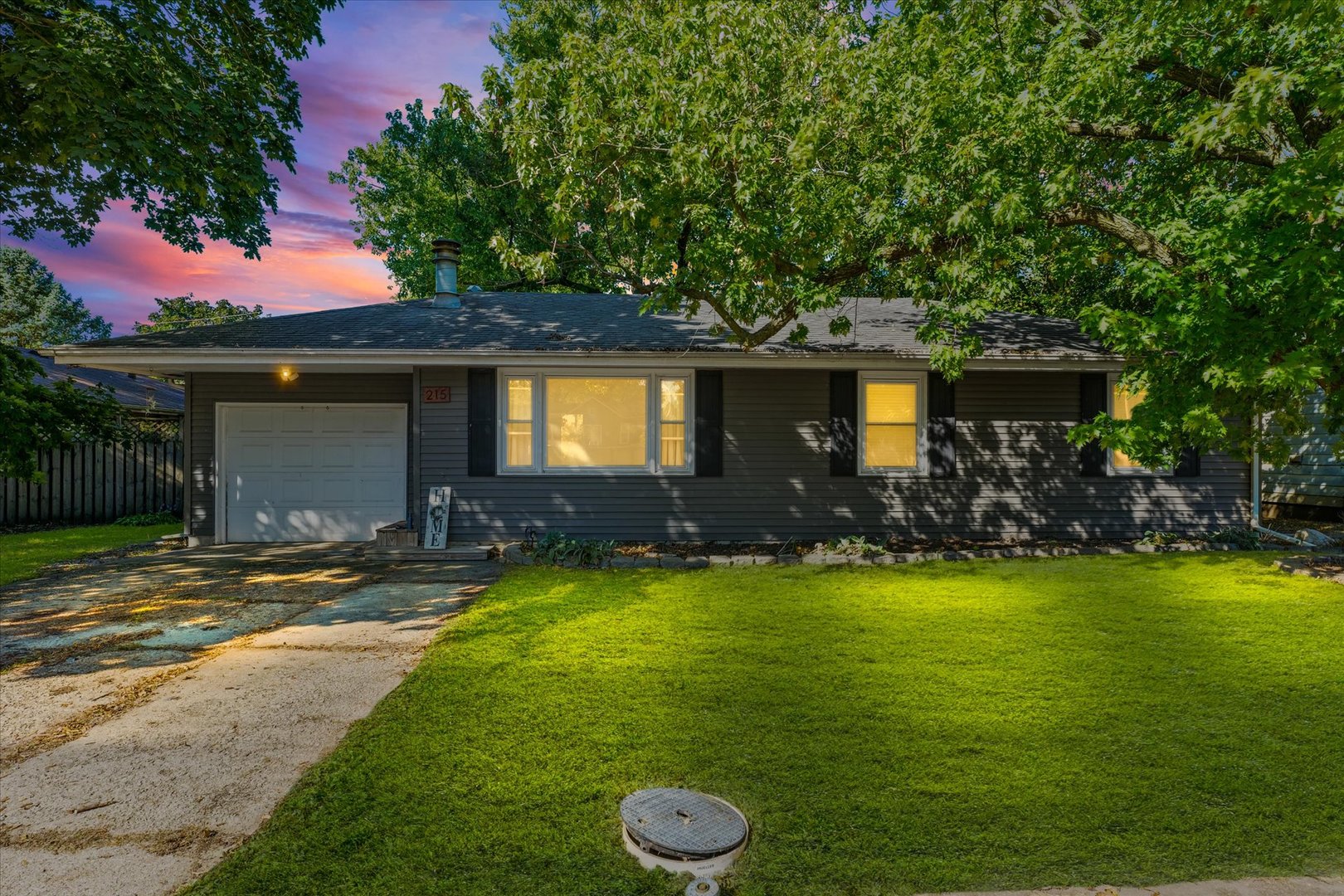 215 North 3rd Street Fisher, IL 61843 - Photo 2 of 32 a view of a house with swimming pool and a yard