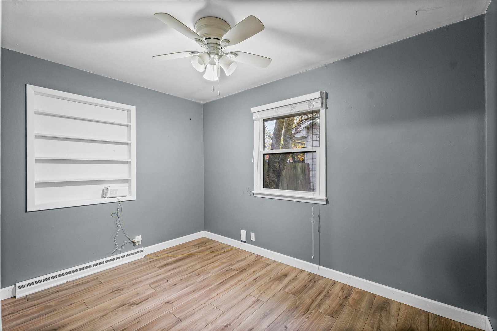 215 North 3rd Street Fisher, IL 61843 - Photo 22 of 32 a view of an empty room with a window