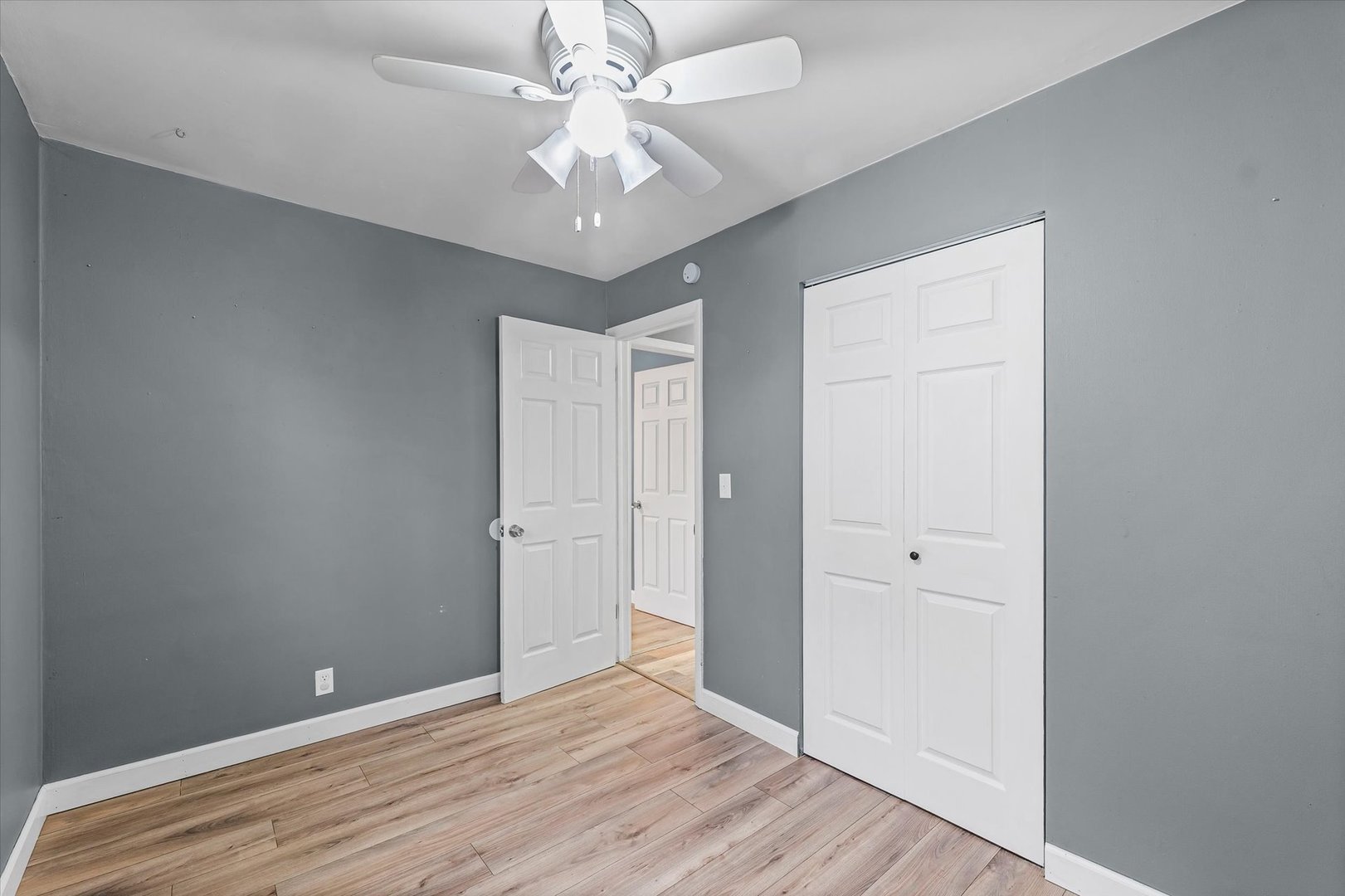 215 North 3rd Street Fisher, IL 61843 - Photo 23 of 32 wooden floor in an empty room with a window