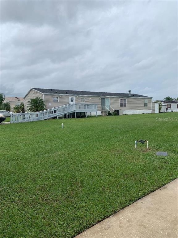 303 Morgan Way Kissimmee, FL 34758 - Photo 1 of 1 a view of a garden with an outdoor space