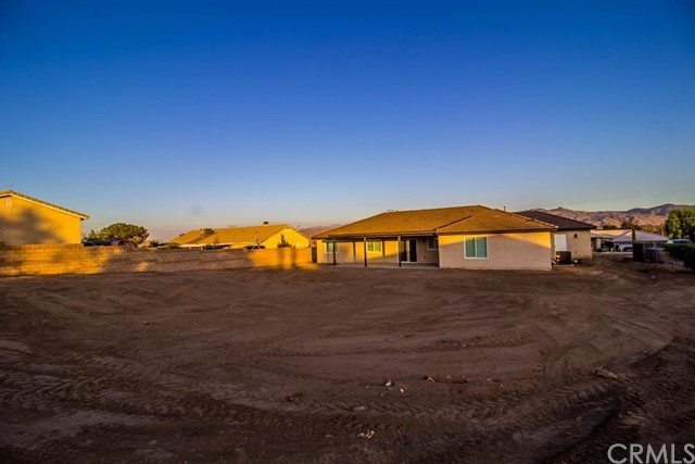 15648 Halinor Street Hesperia, CA 92345 - Photo 23 of 24 a view of a house with yard and sitting area
