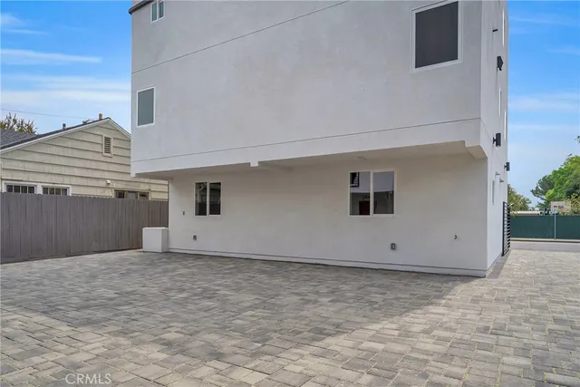 a front view of a house with garage