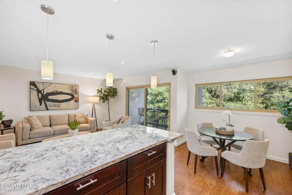 23637 Park Capri, Unit 36 Calabasas, CA 91302 - Photo 20 of 39 a living room with furniture and wooden floor