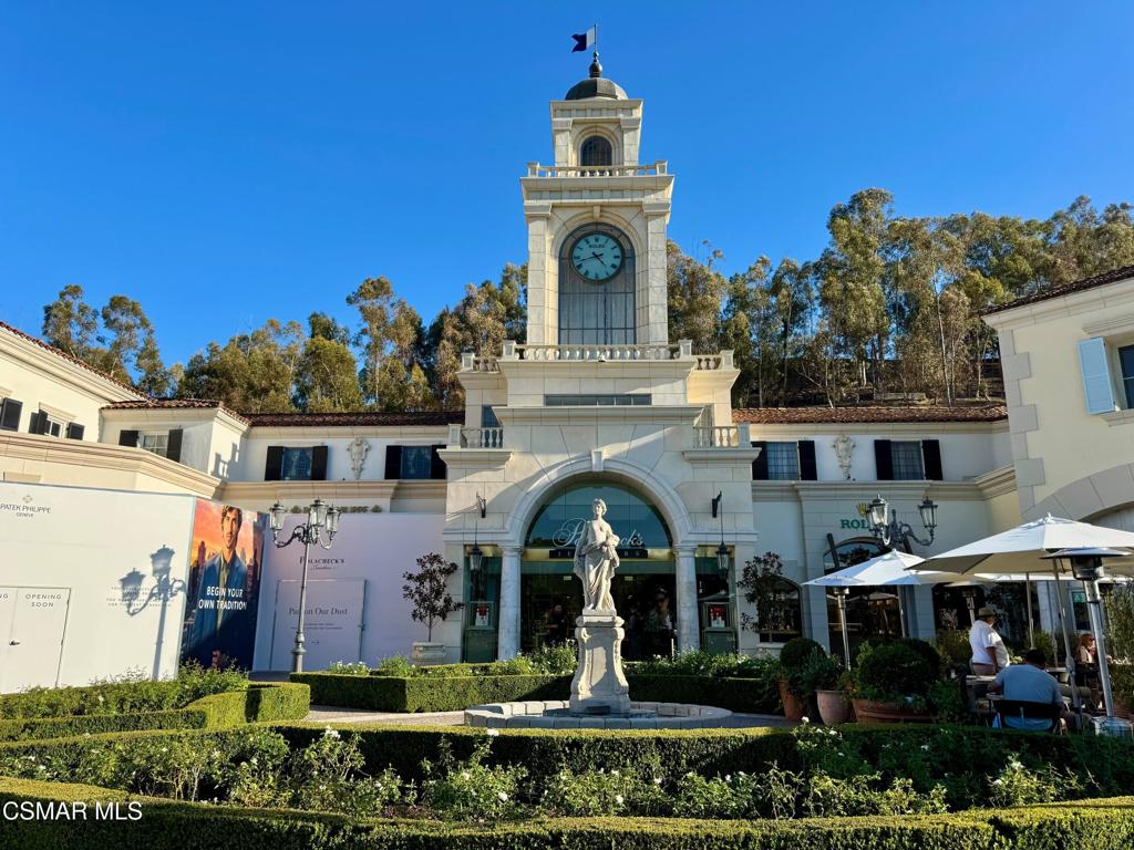 23637 Park Capri, Unit 36 Calabasas, CA 91302 - Photo 38 of 39 a front view of a house with a garden