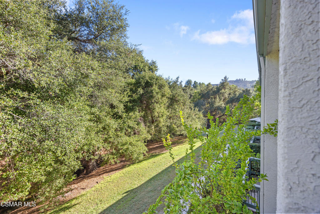 23637 Park Capri, Unit 36 Calabasas, CA 91302 - Photo 10 of 39 a view of a yard with an trees