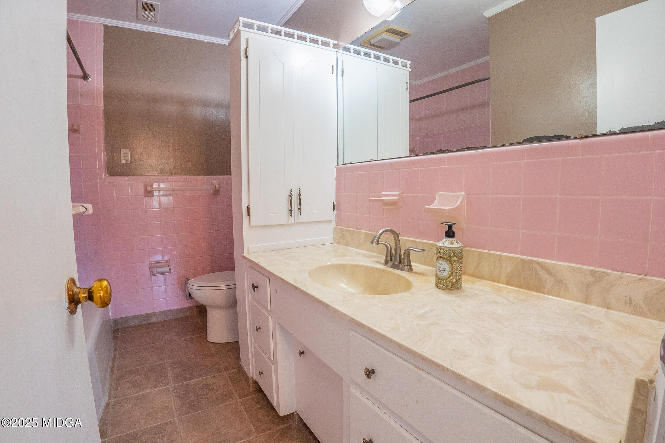 2939 General Lee Road Macon, GA 31204 - Photo 18 of 38 a bathroom with a granite countertop sink a toilet a mirror and shower