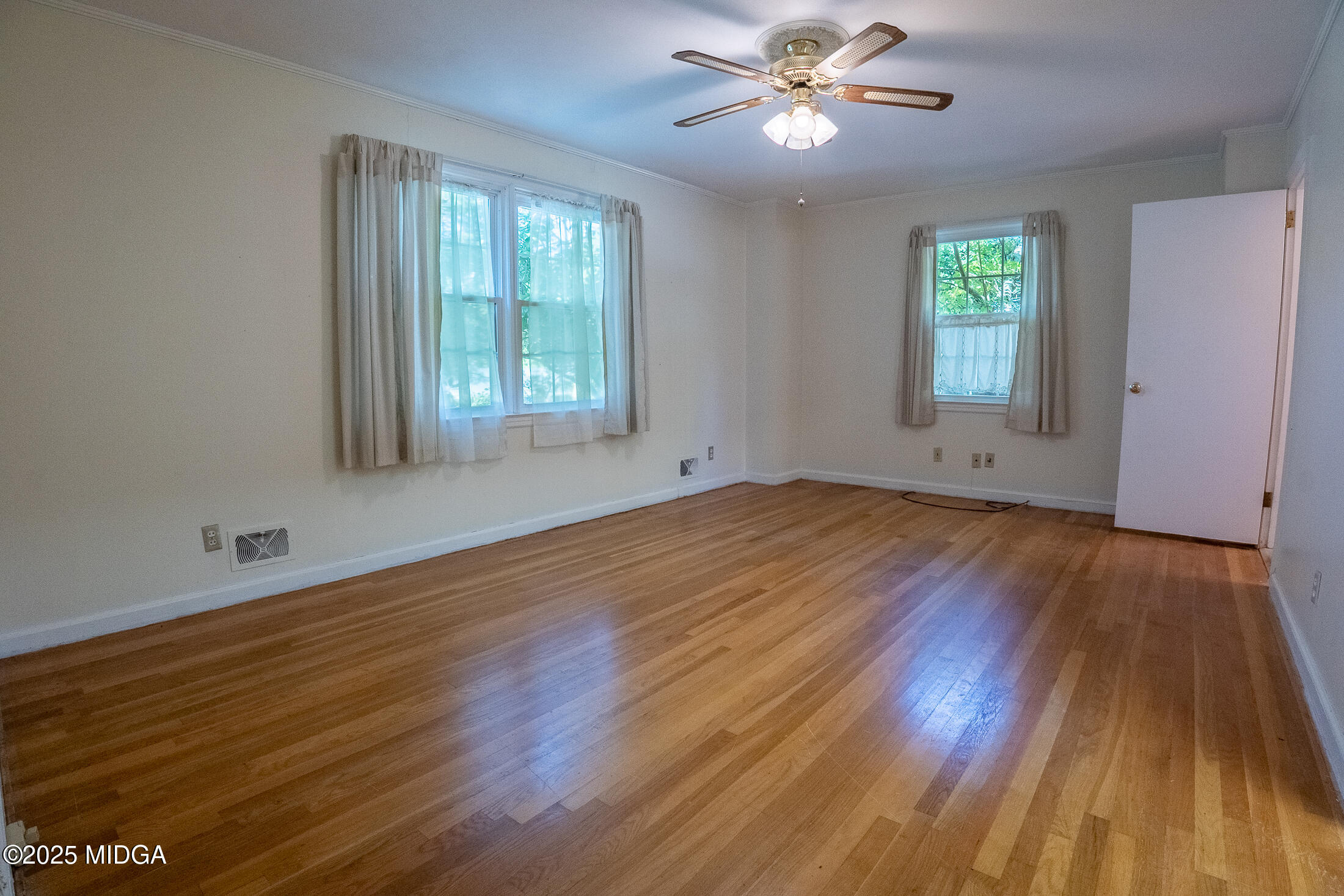 2939 General Lee Road Macon, GA 31204 - Photo 32 of 38 a view of empty room with wooden floor and fan