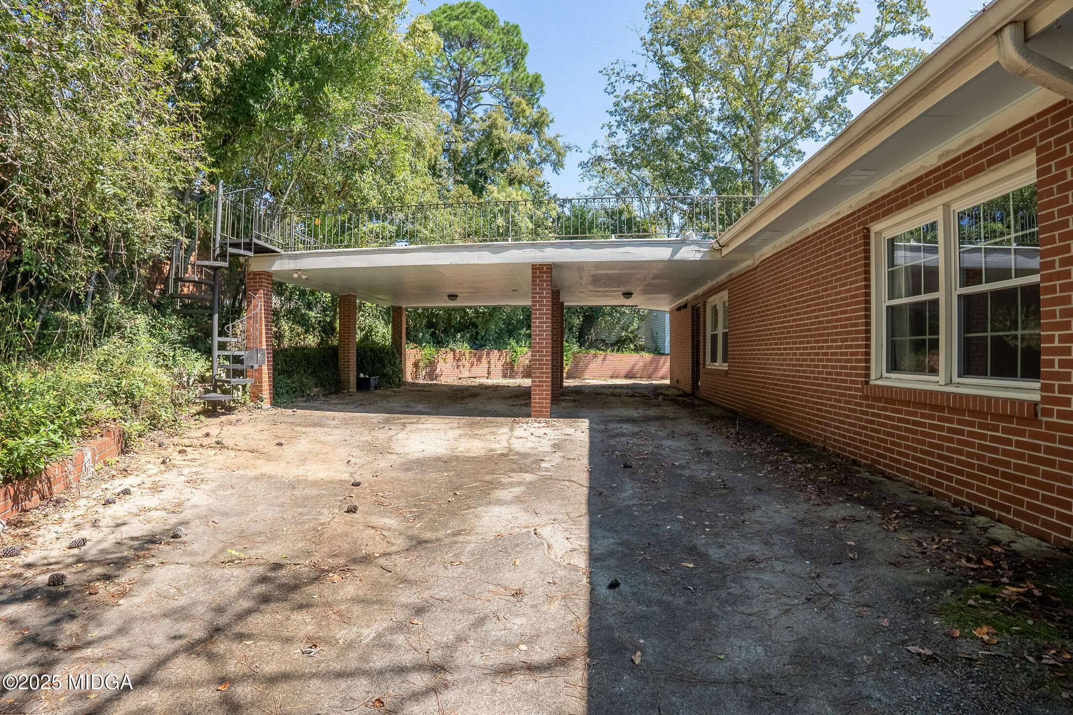 2939 General Lee Road Macon, GA 31204 - Photo 35 of 38 a view of backyard with large trees and plants