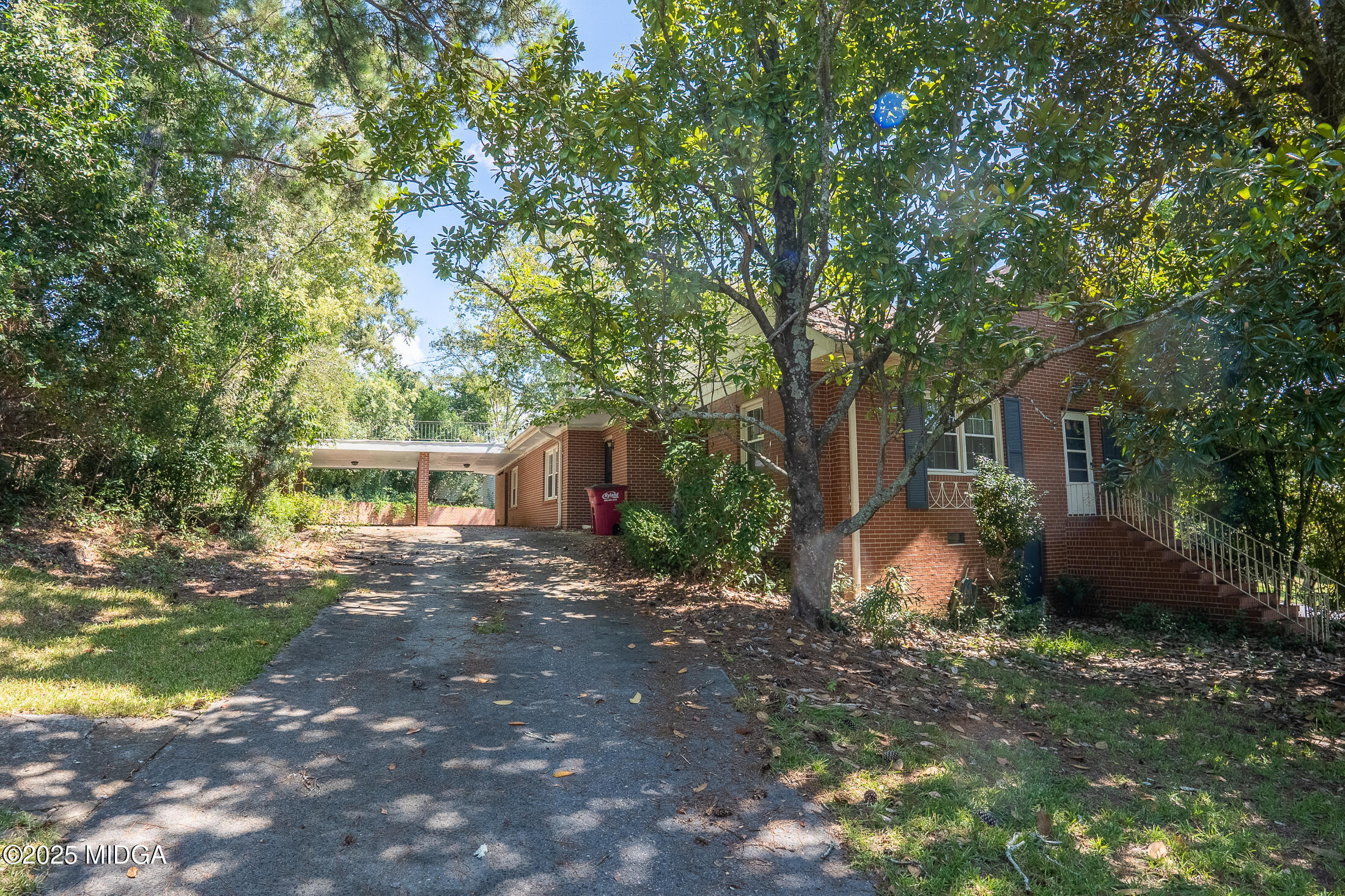 2939 General Lee Road Macon, GA 31204 - Photo 36 of 38 a backyard of a house with seating space