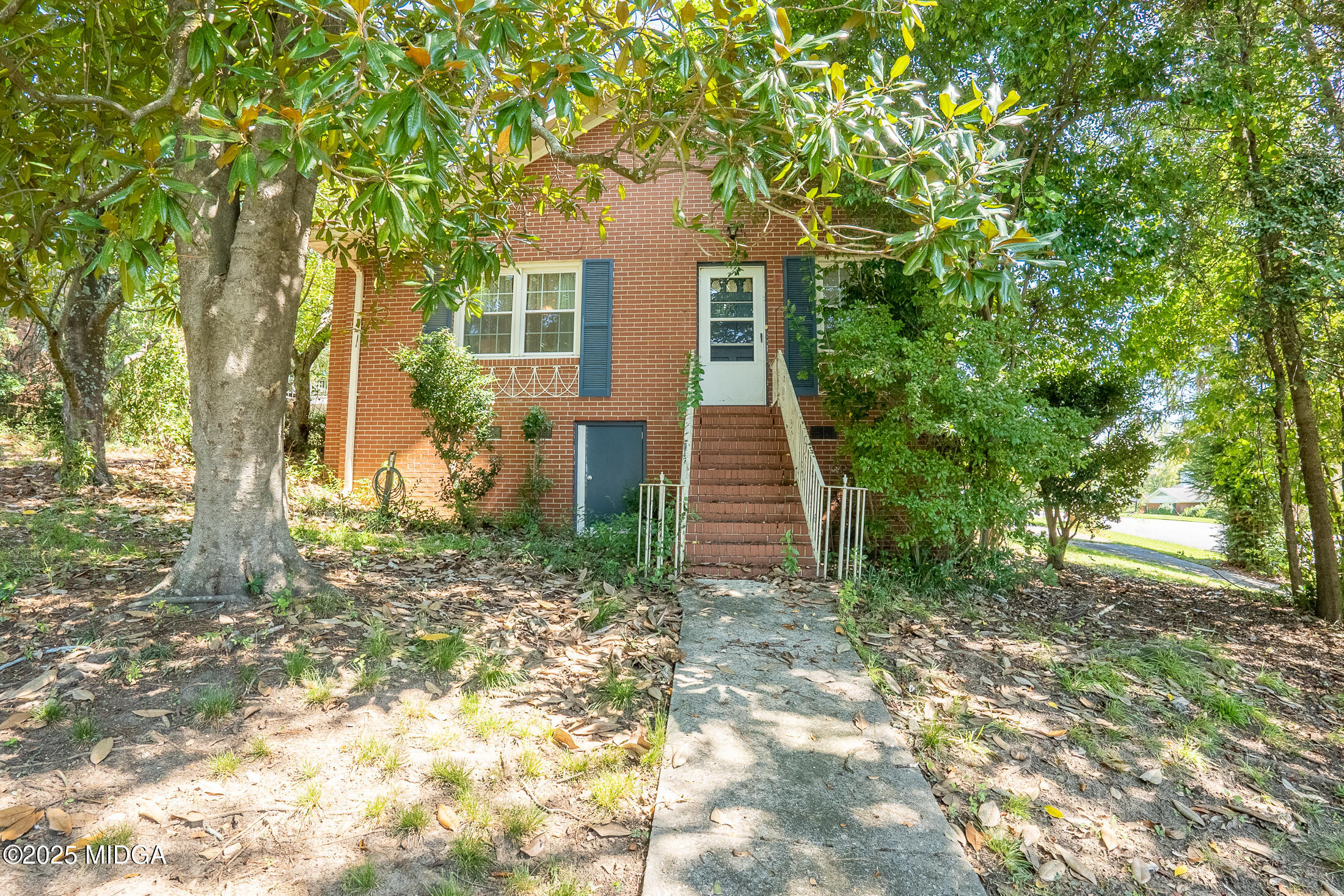 2939 General Lee Road Macon, GA 31204 - Photo 37 of 38 a front view of a house with a tree