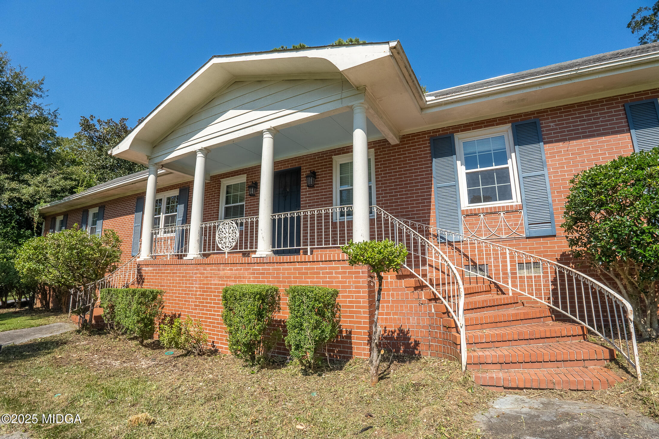 2939 General Lee Road Macon, GA 31204 - Photo 4 of 38 a front view of a house with a yard