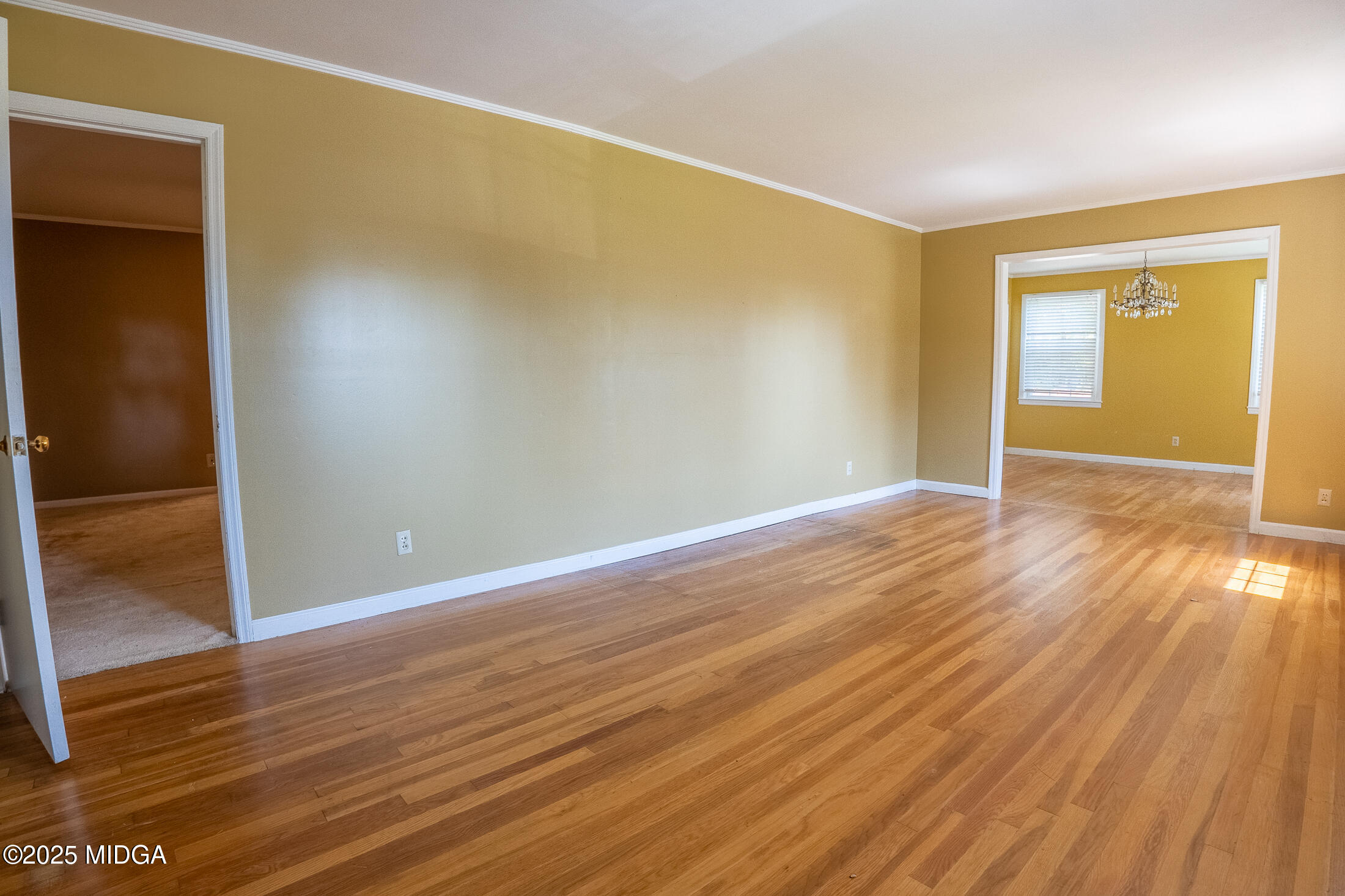 2939 General Lee Road Macon, GA 31204 - Photo 6 of 38 an empty room with wooden floor and closet
