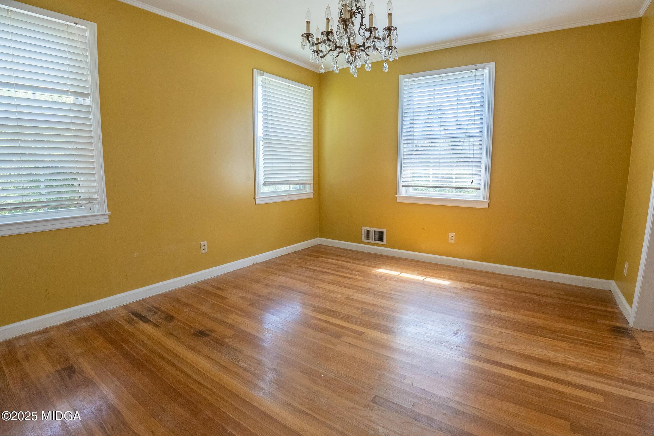 2939 General Lee Road Macon, GA 31204 - Photo 8 of 38 a view of empty room with wooden floor and fan