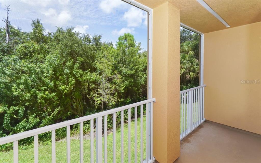 7339 Black Walnut Way Lakewood Ranch, FL 34202 - Photo 11 of 27 a view of a balcony with an outdoor space