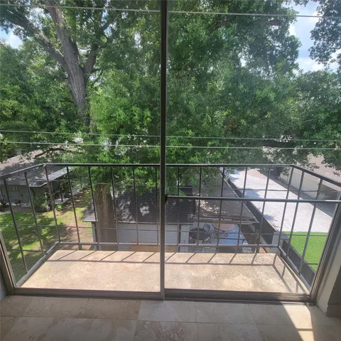 a view of a door with a backyard