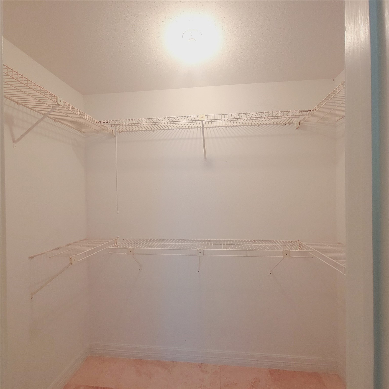 2333 Bering Drive, Unit 226 Houston, TX 77057 - Photo 18 of 33 a view of a room with racks on the wall