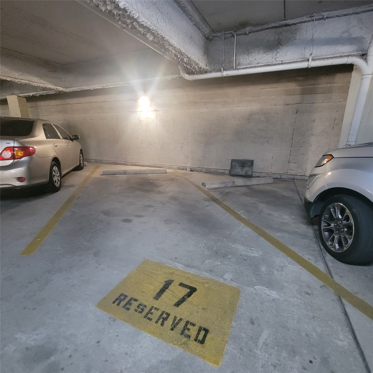 2333 Bering Drive, Unit 226 Houston, TX 77057 - Photo 32 of 33 a view of parking garage with cars parked