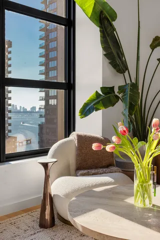 a bathroom with a toilet sink and shower
