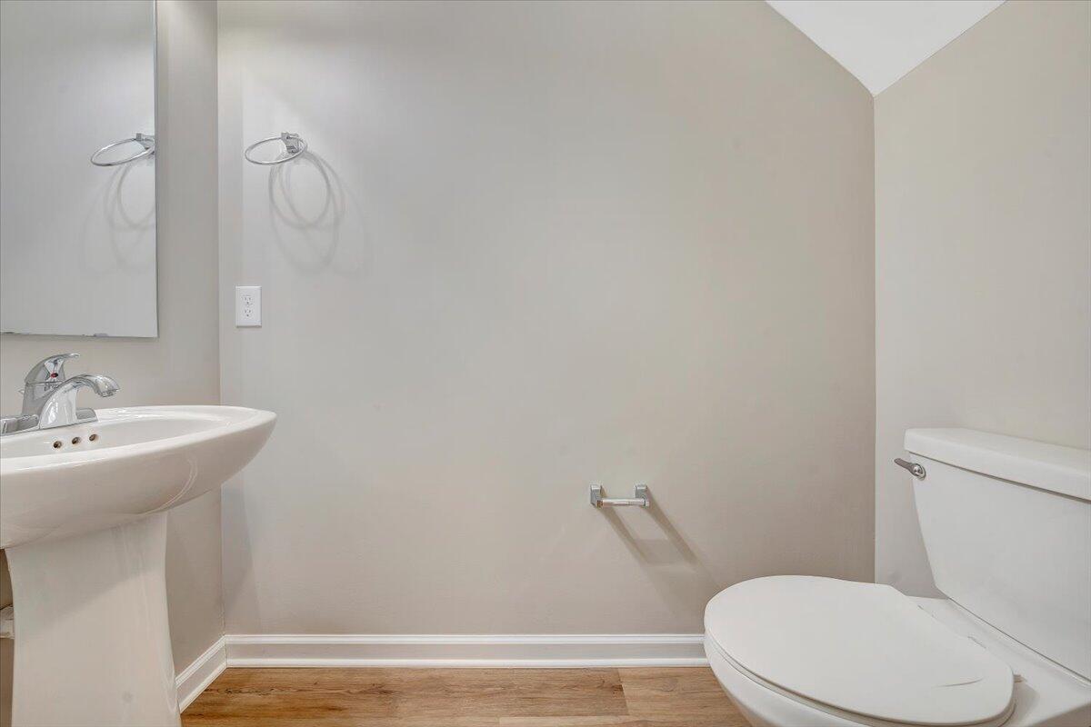 5663 Huntridge Road Roanoke, VA 24019 - Photo 13 of 19 a white toilet sitting next to a bathroom sink