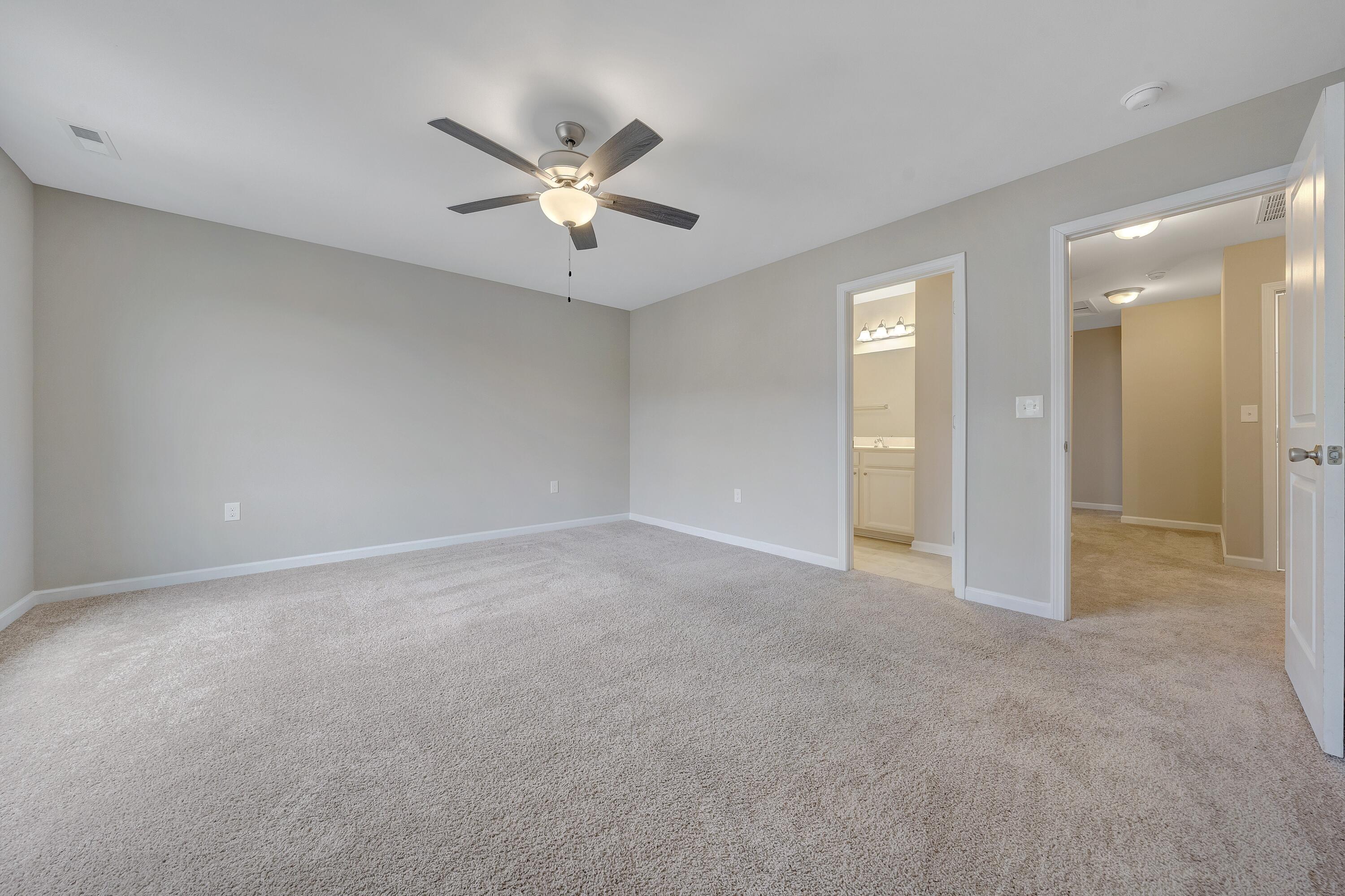 5663 Huntridge Road Roanoke, VA 24019 - Photo 15 of 19 a view of an empty room with a fan