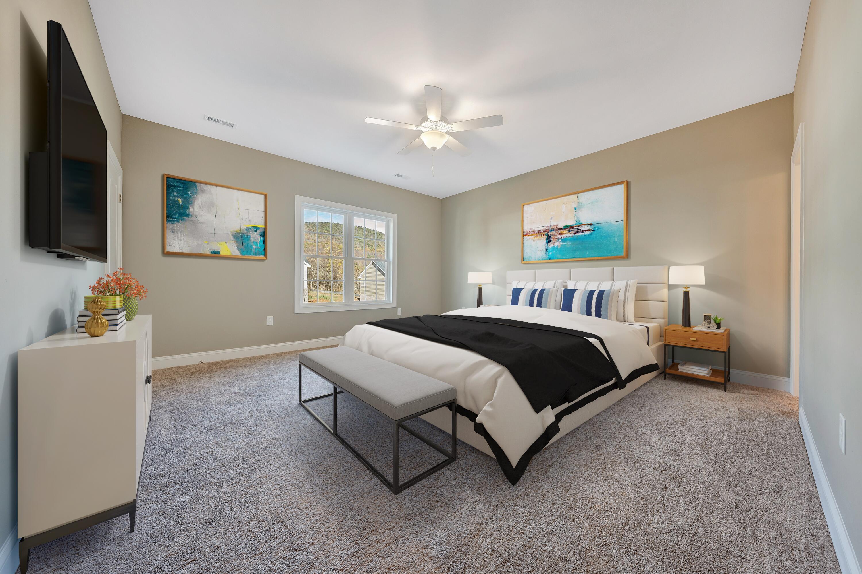 5663 Huntridge Road Roanoke, VA 24019 - Photo 16 of 19 a spacious bedroom with a bed and a flat screen tv