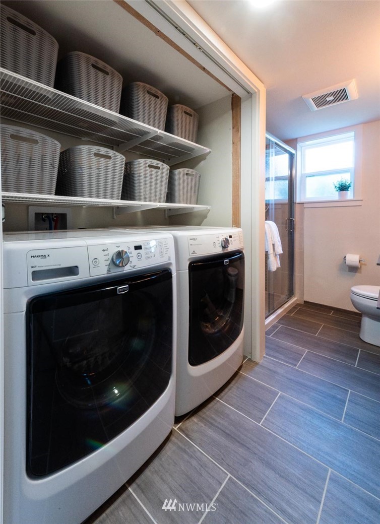 4500 Southeast 2nd Street Renton, WA 98059 - Photo 22 of 29 a utility room with dryer and washer
