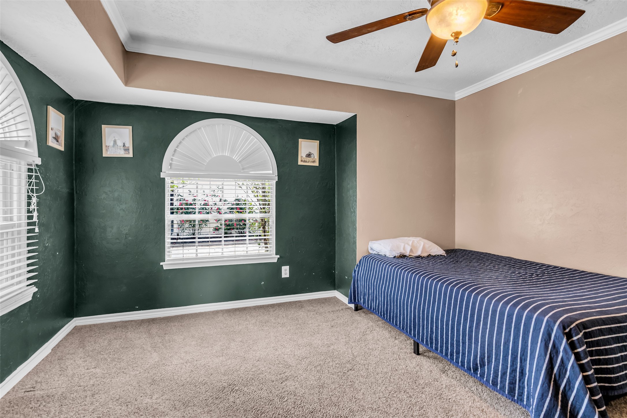 21807 Meadowhill Drive Spring, TX 77388 - Photo 19 of 25 a bedroom with a bed and a window