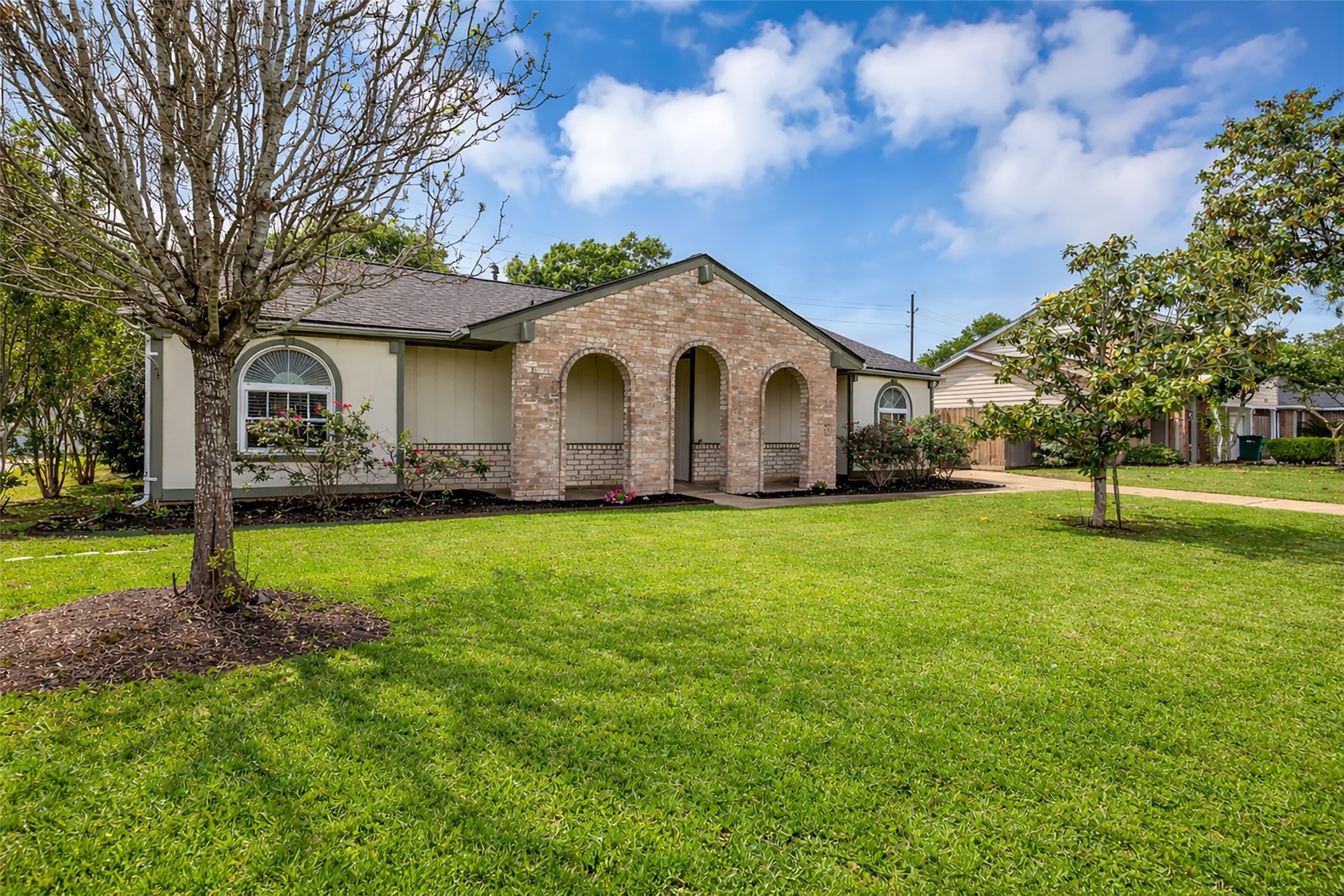 21807 Meadowhill Drive Spring, TX 77388 - Photo 2 of 25 a front view of house with yard and green space