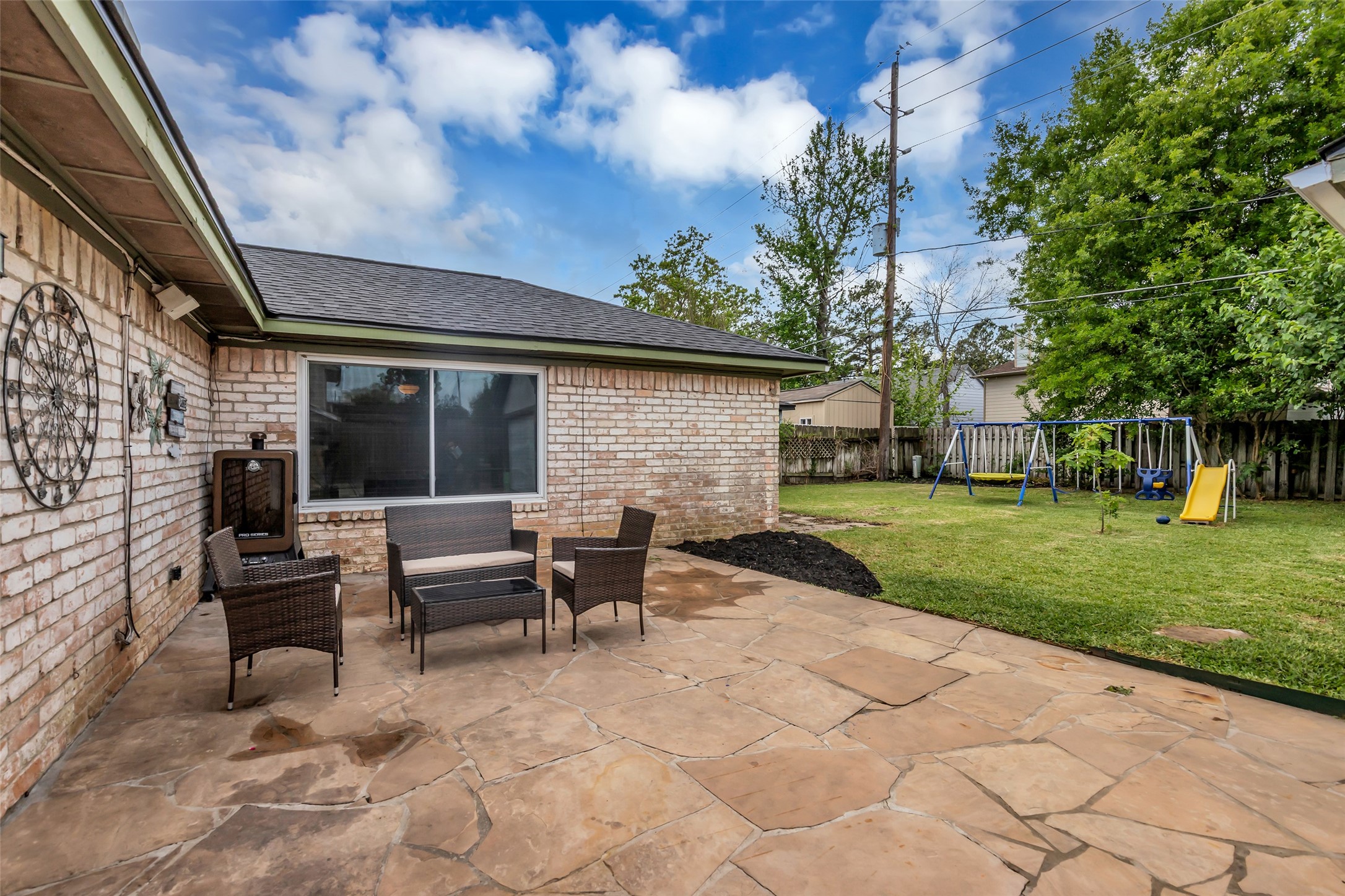 21807 Meadowhill Drive Spring, TX 77388 - Photo 22 of 25 a view of a house with backyard and sitting area