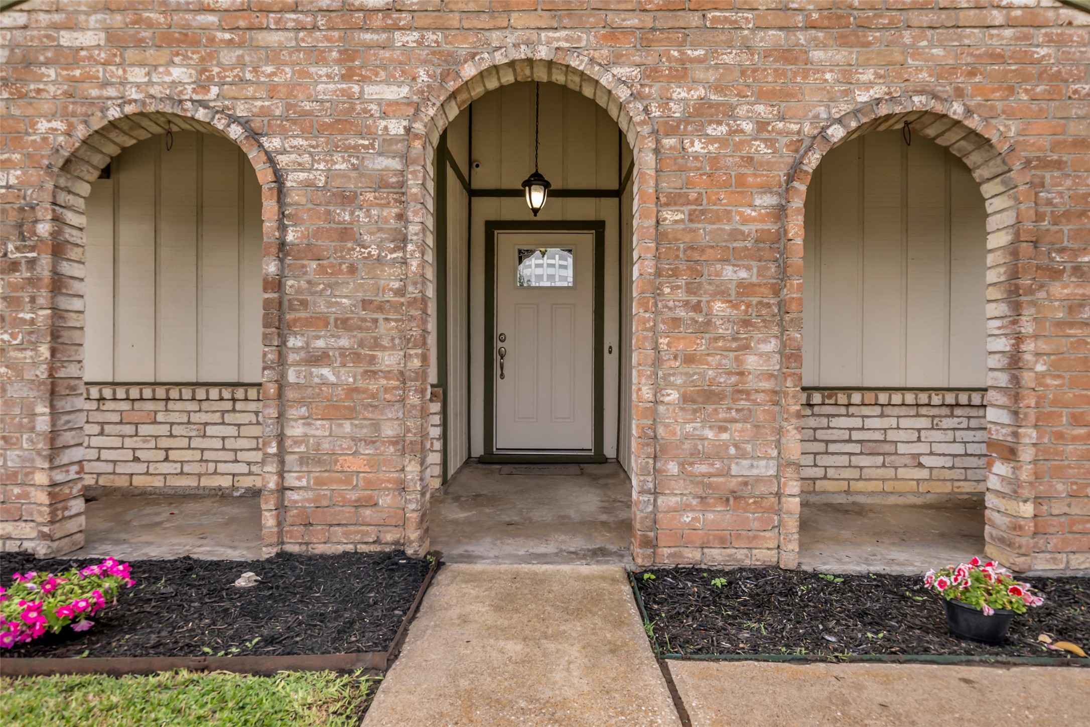 21807 Meadowhill Drive Spring, TX 77388 - Photo 4 of 25 a front view of a house with a garden