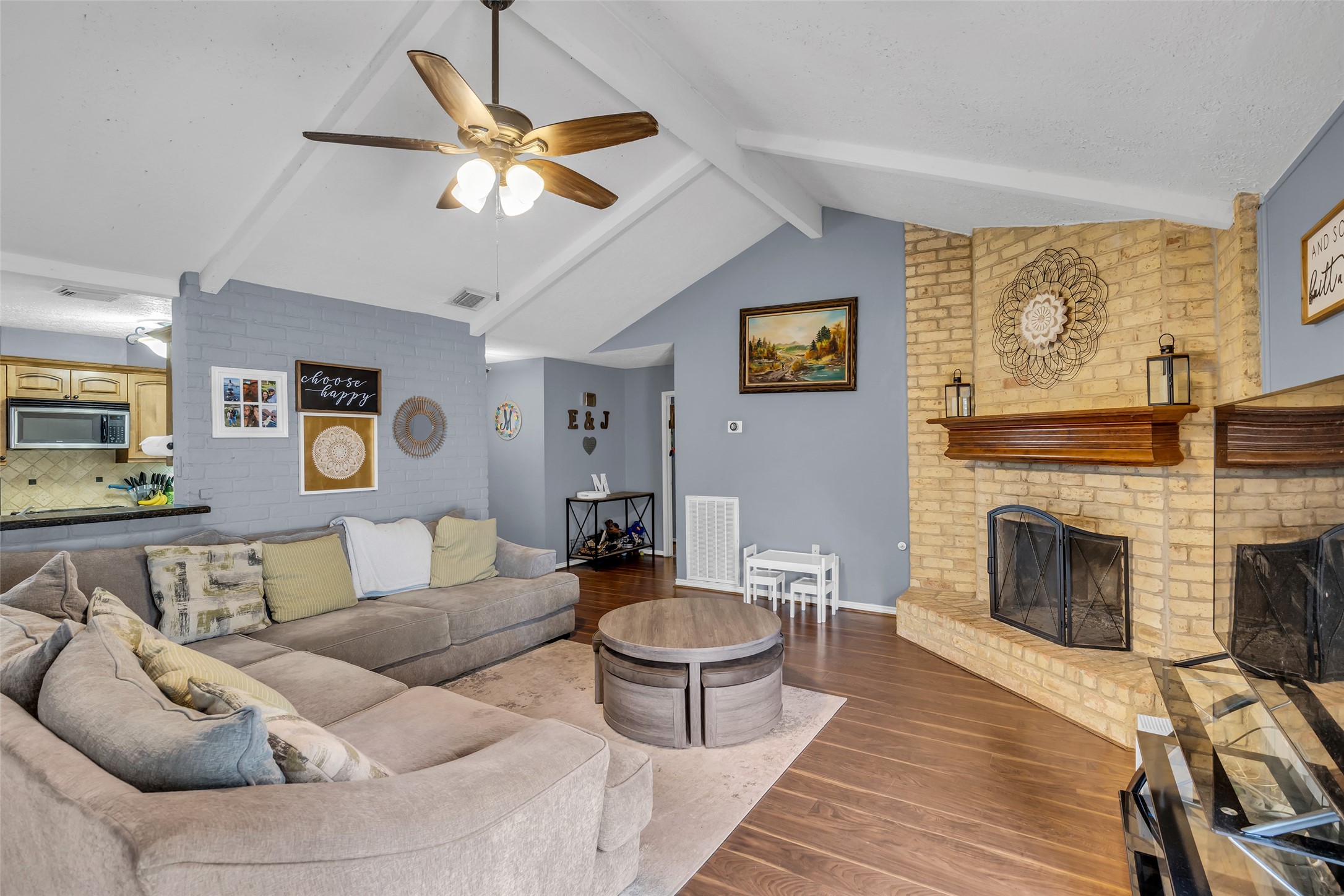 21807 Meadowhill Drive Spring, TX 77388 - Photo 5 of 25 a living room with furniture and a fireplace