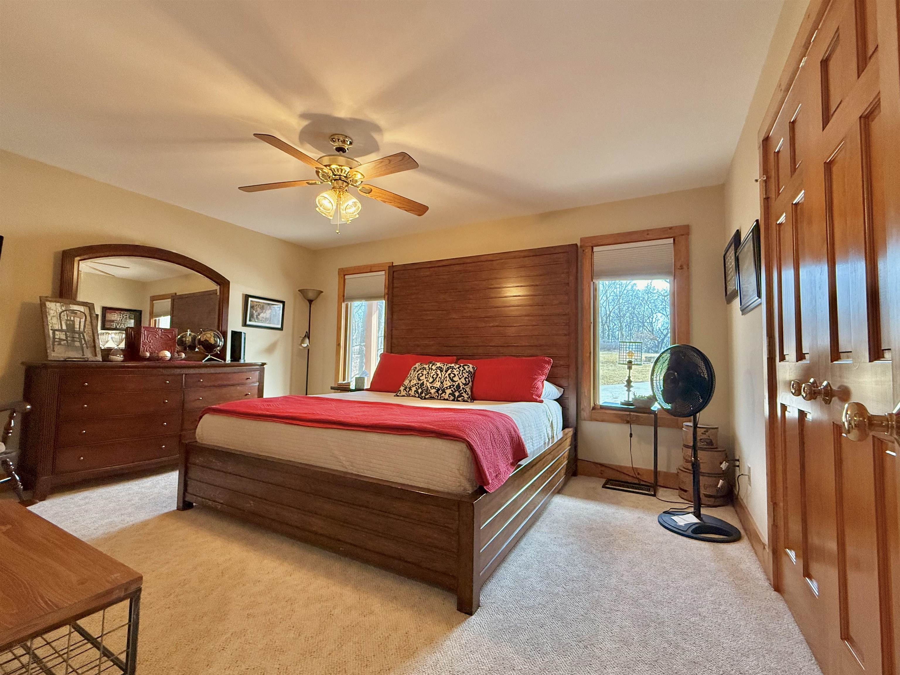 1 Tamarack Row Elizabeth, IL 61028 - Photo 13 of 38 a bedroom with a bed and a chandelier