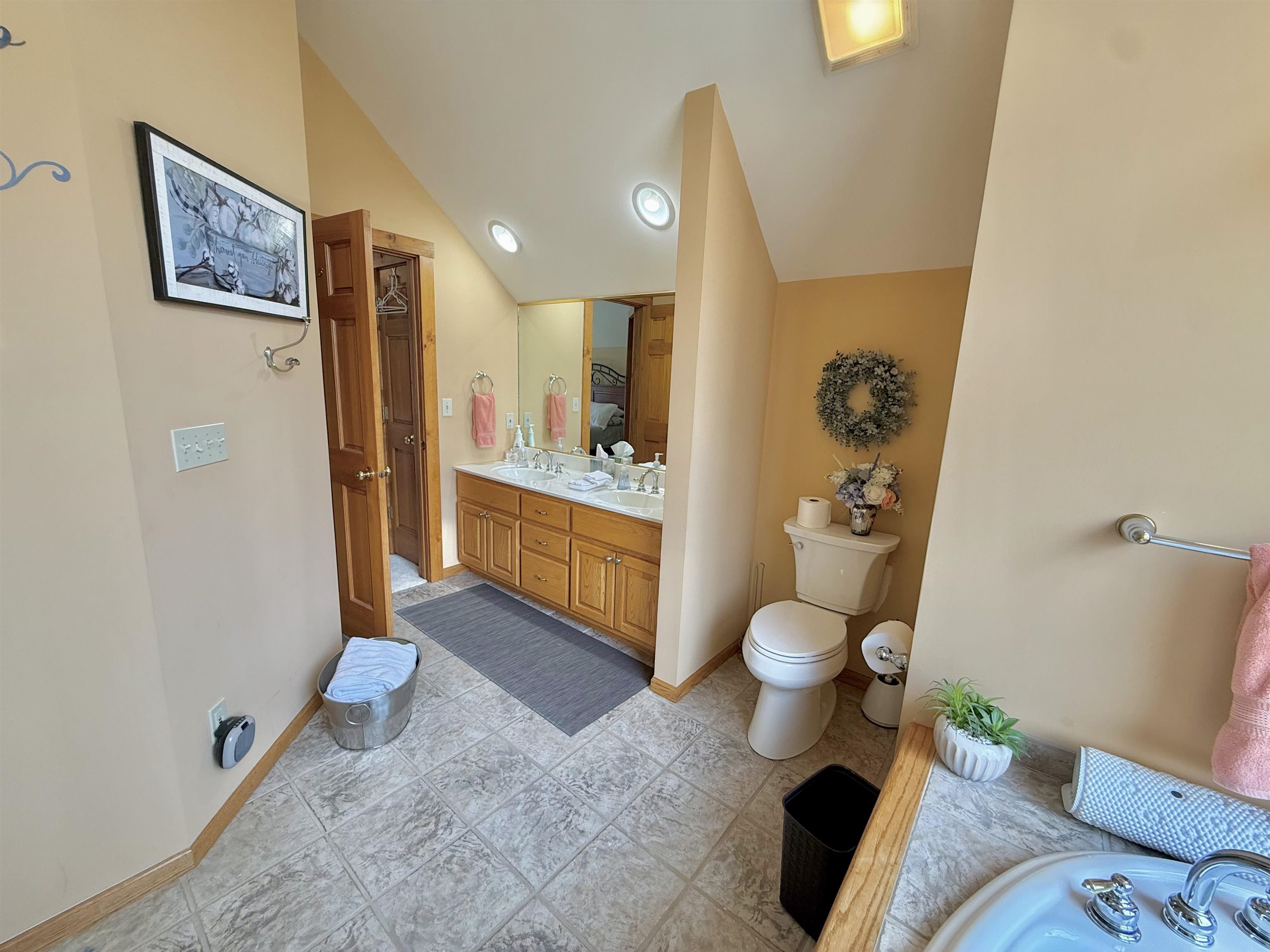 1 Tamarack Row Elizabeth, IL 61028 - Photo 21 of 38 a bathroom with a toilet sink and shower curtain