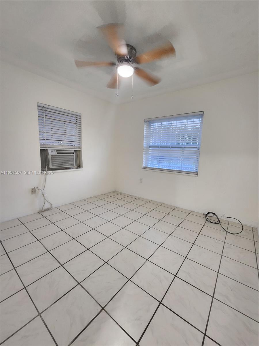 405 Northwest 64th Street, Unit 2 Miami, FL 33150 - Photo 10 of 13 a view of an empty room