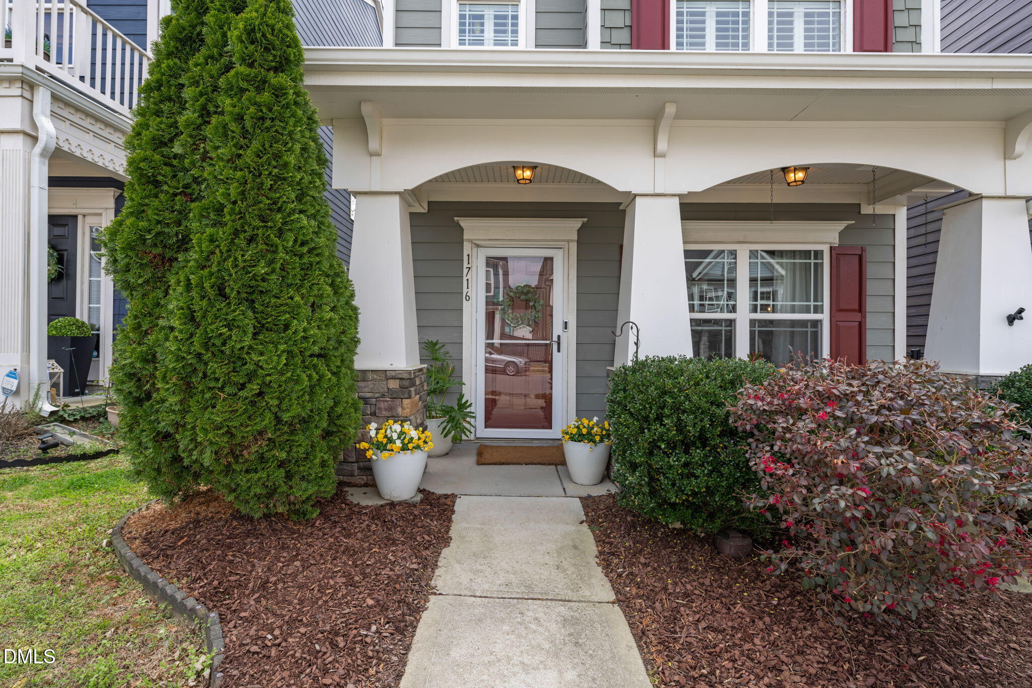 1716 Main Divide Drive Wake Forest, NC 27587 - Photo 2 of 45 a view of a brick house with plants