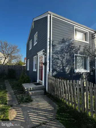 a front view of a house with yard