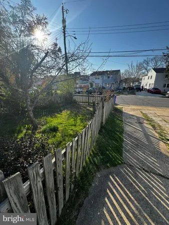 a view of a street with sitting area