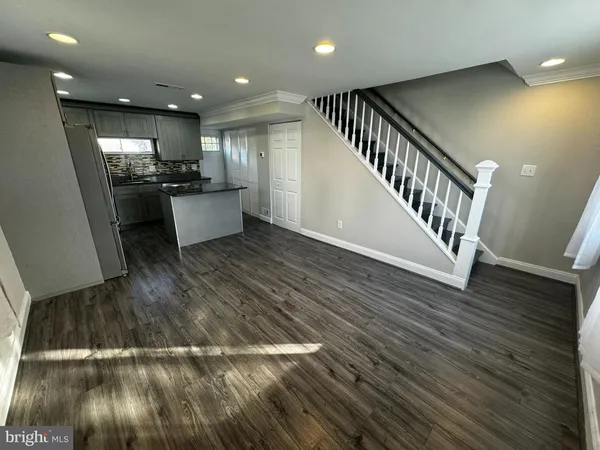 a view of a kitchen from the hallway