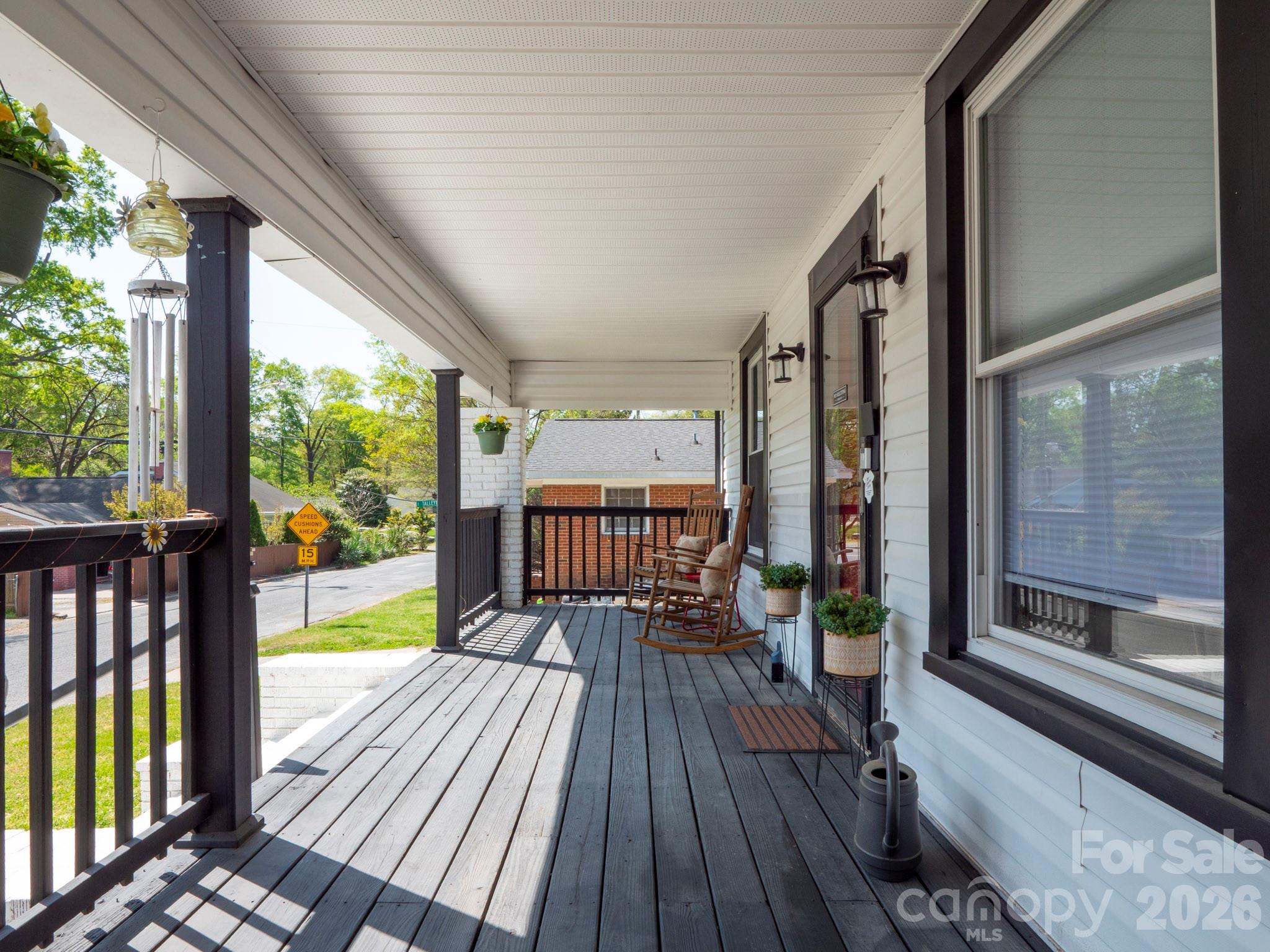 208 Hough Street Monroe, NC 28112 - Photo 5 of 32 a view of balcony with wooden floor