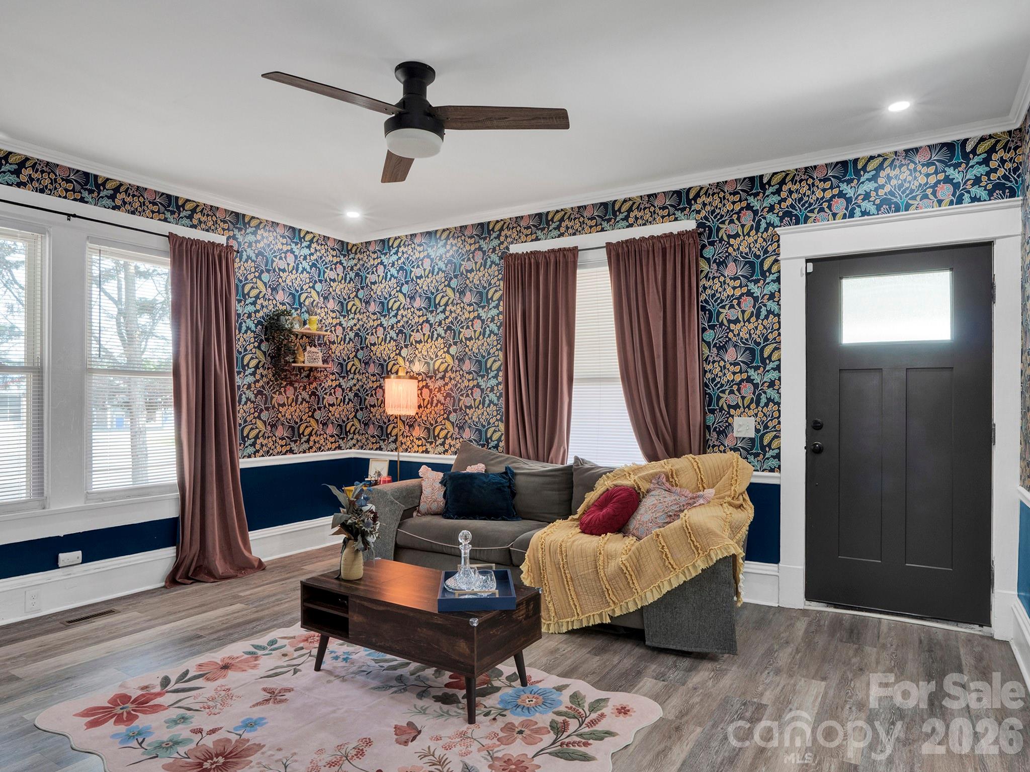 208 Hough Street Monroe, NC 28112 - Photo 6 of 32 a living room with furniture and a large window