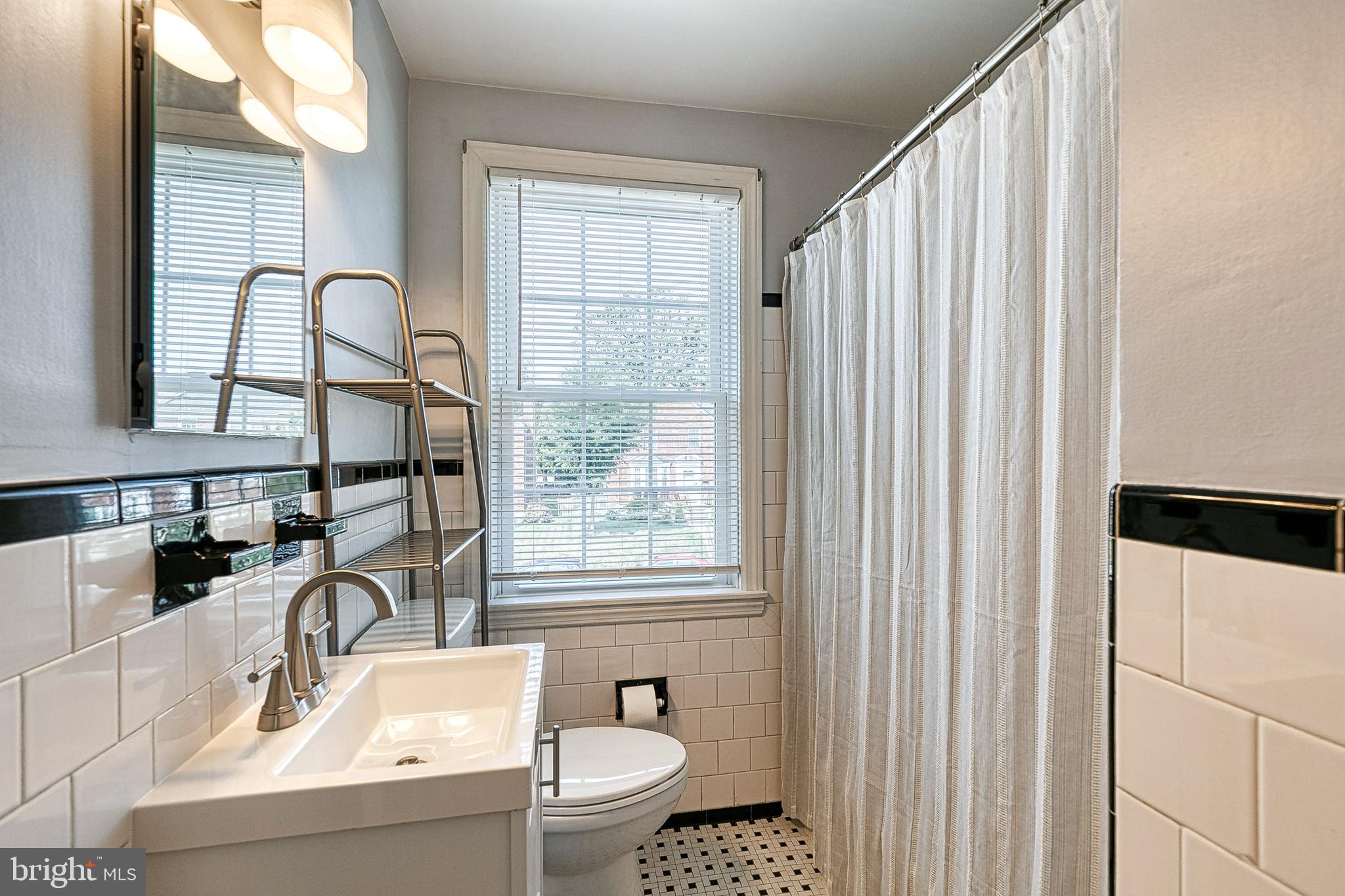 333 Whitfield Road Baltimore, MD 21228 - Photo 21 of 35 Upper level full bath with new vanity