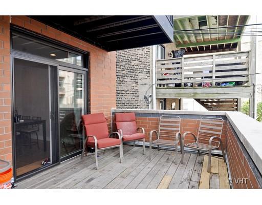 950 West Cullerton Street, Unit A Chicago, IL 60608 - Photo 12 of 12 a view of a chairs and table in the balcony